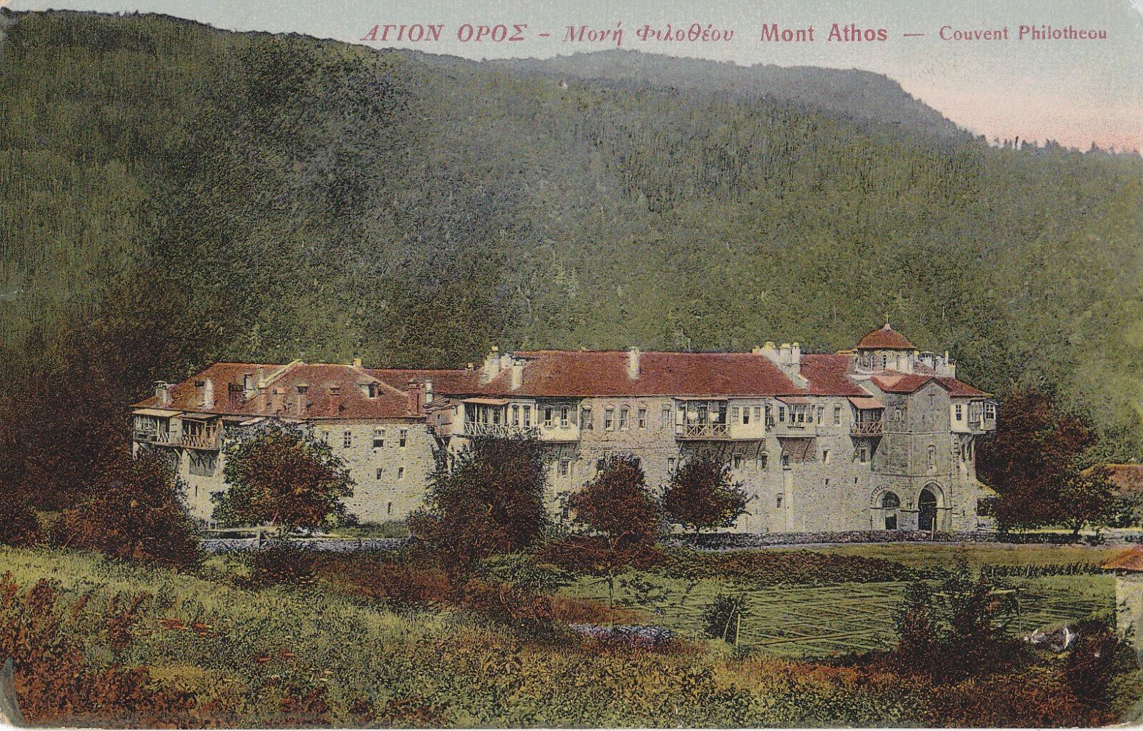 An early colored view of Philotheou Monastery among the wooded slopes of Mount Athos